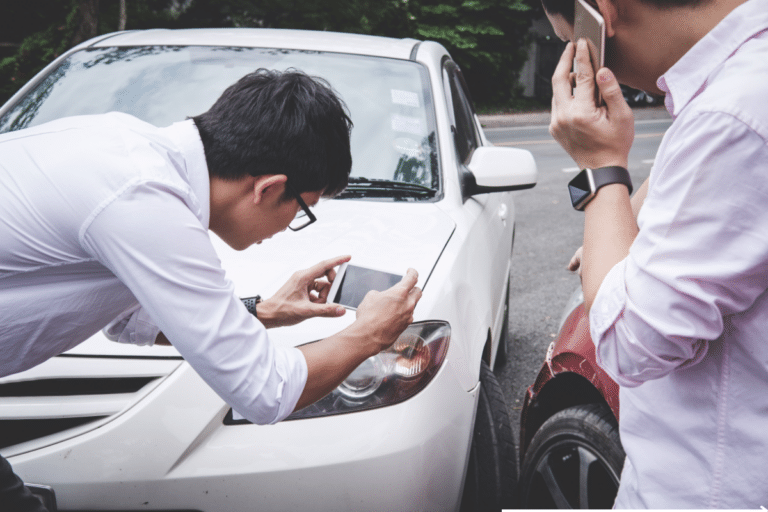 Two men arguing after car collision