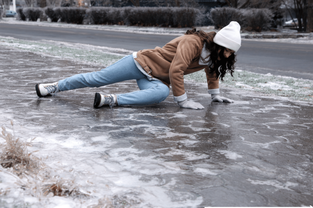 A lady slipping on ice