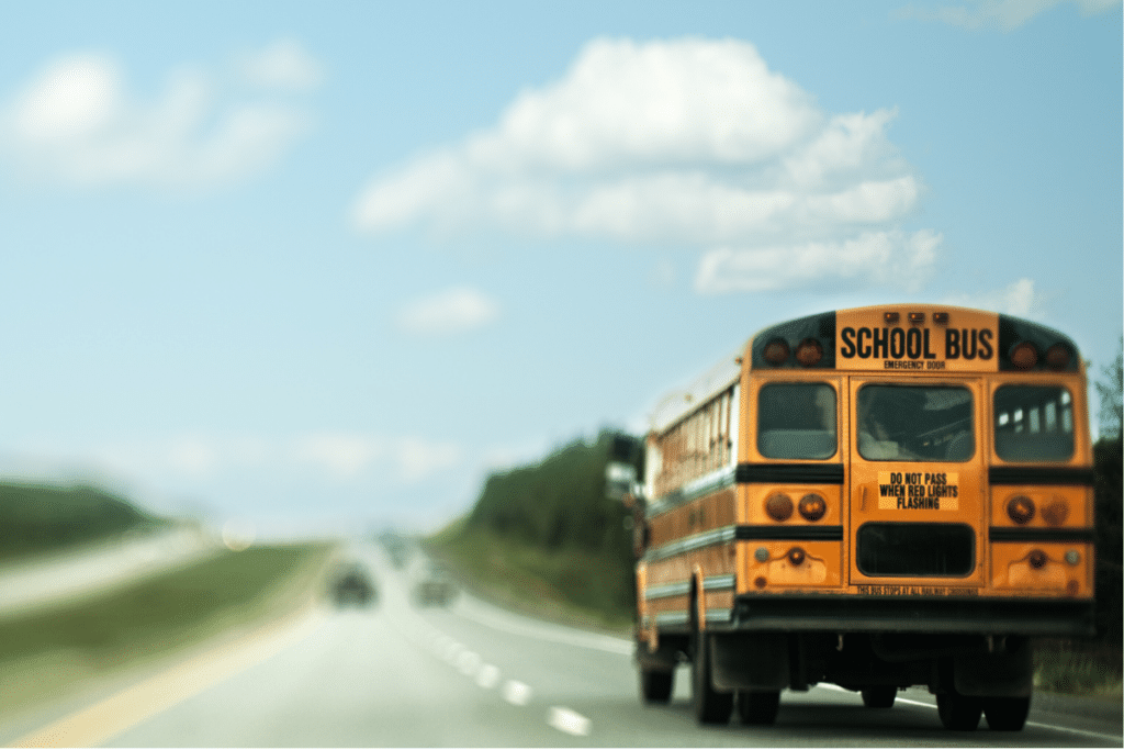 A school bus moving on the road