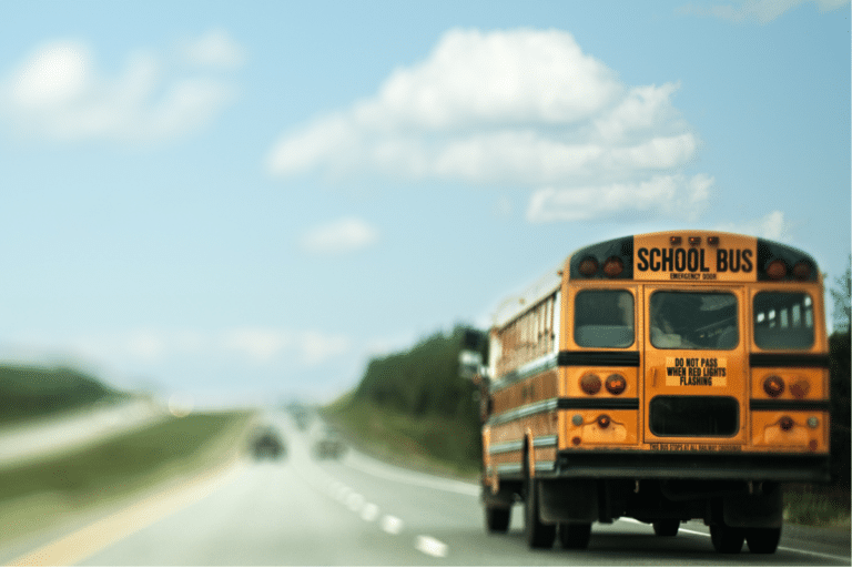 A school bus moving on the road