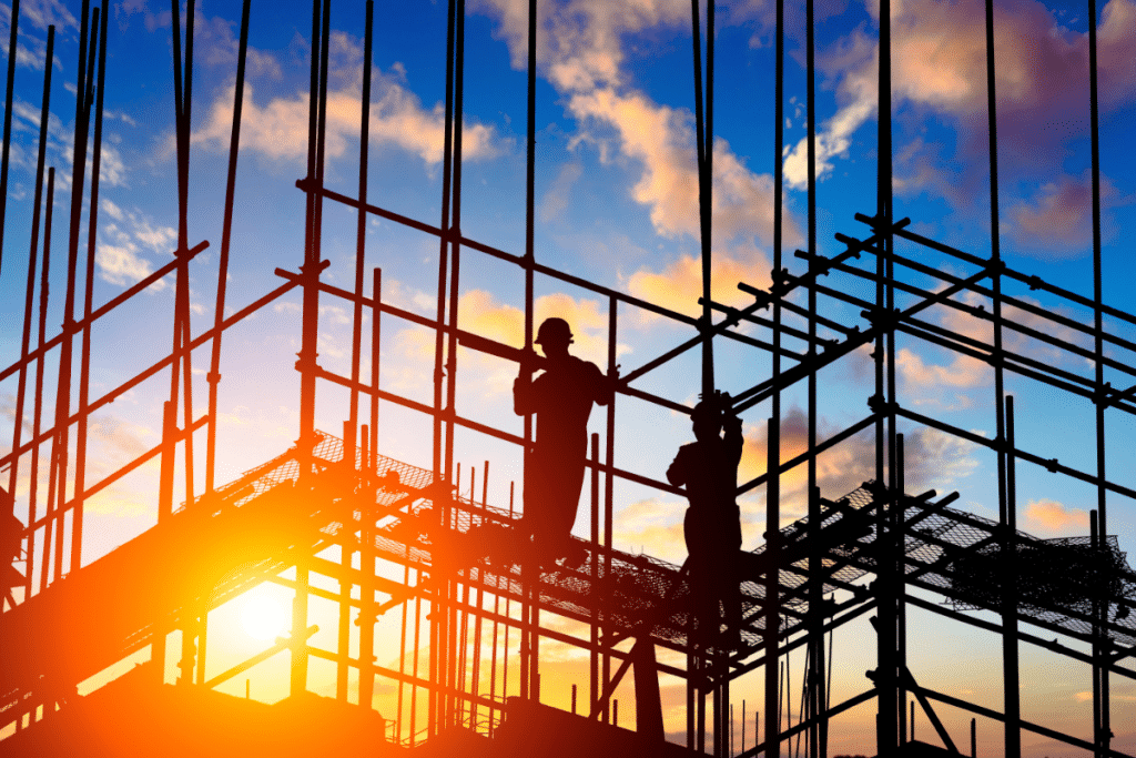 construction workers on a scaffold